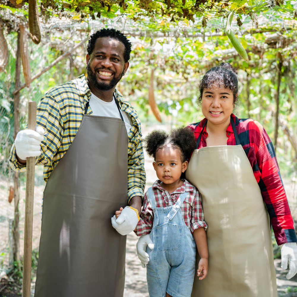 The Sterling family standing together on their smallholding.